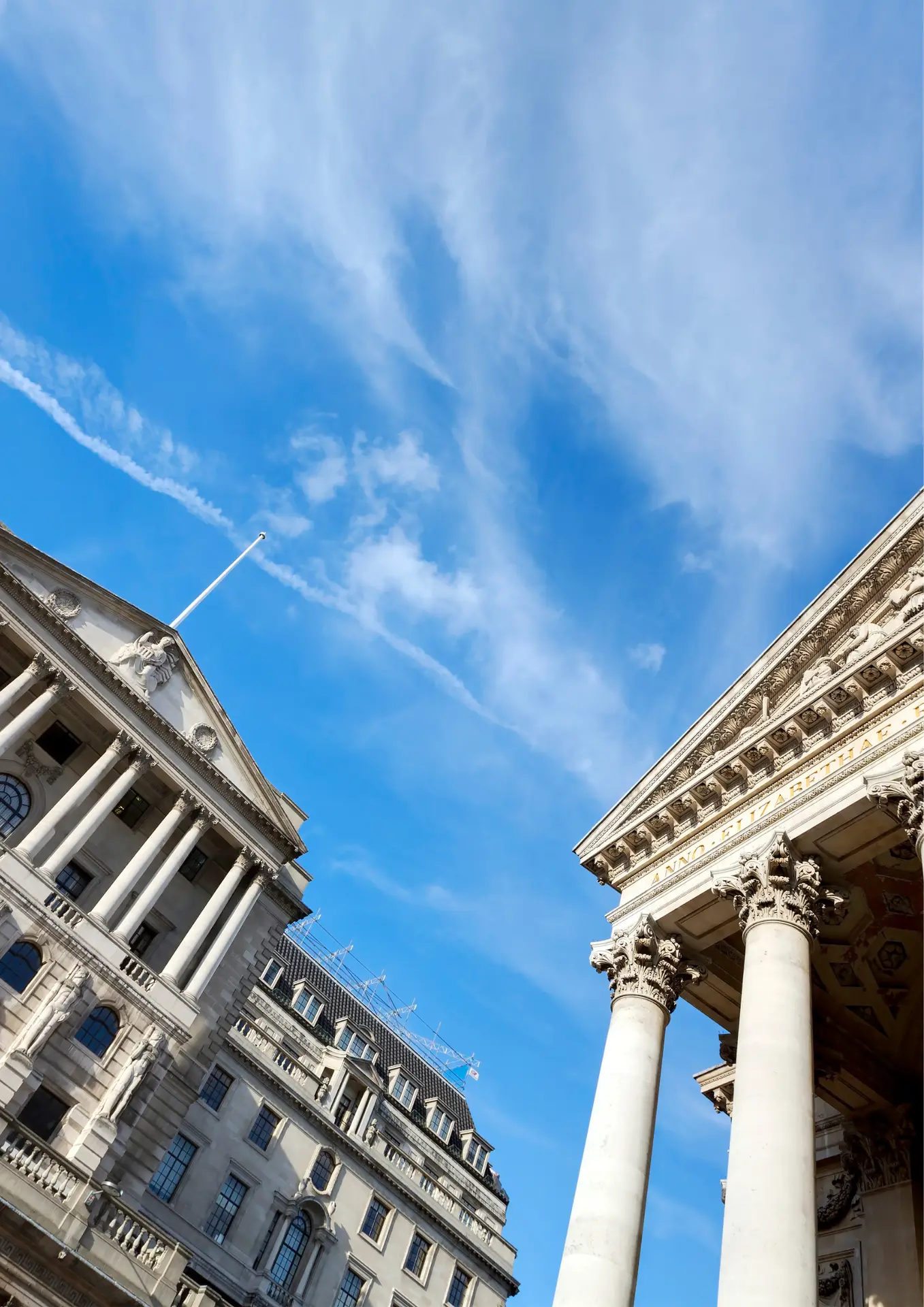 a group of buildings with columns